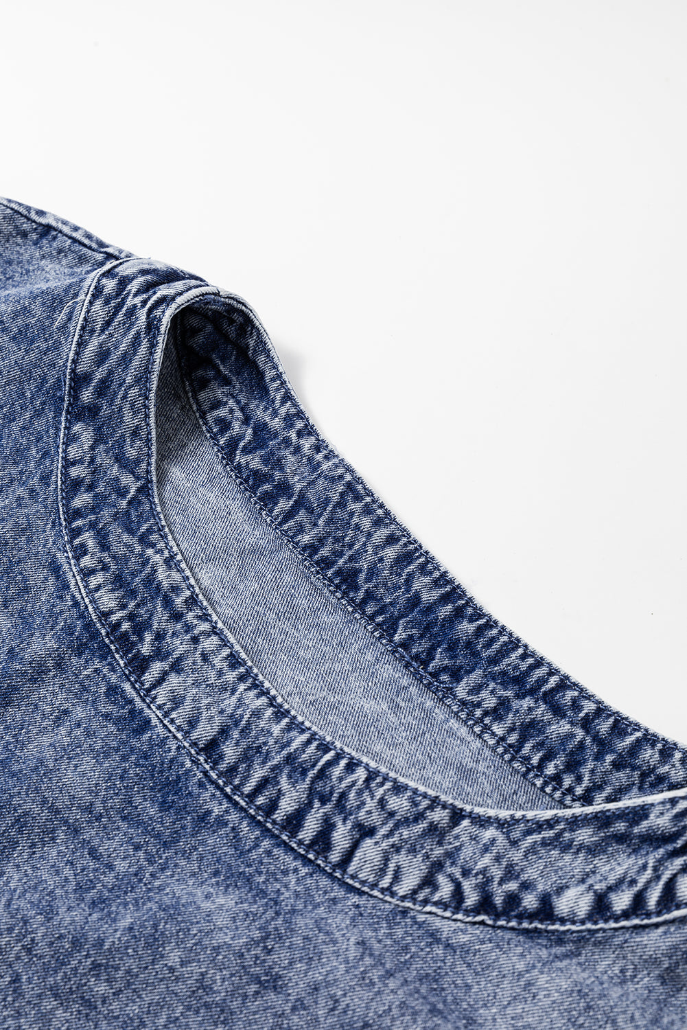 Dusk Blue Acid Wash Pearl Embellishment O Neck Denim TopMaterial:100%Cotton



		The top features a trendy acid wash design with pearl embellishments, adding a touch of sophistication to your outfit.
	
	
		This denim