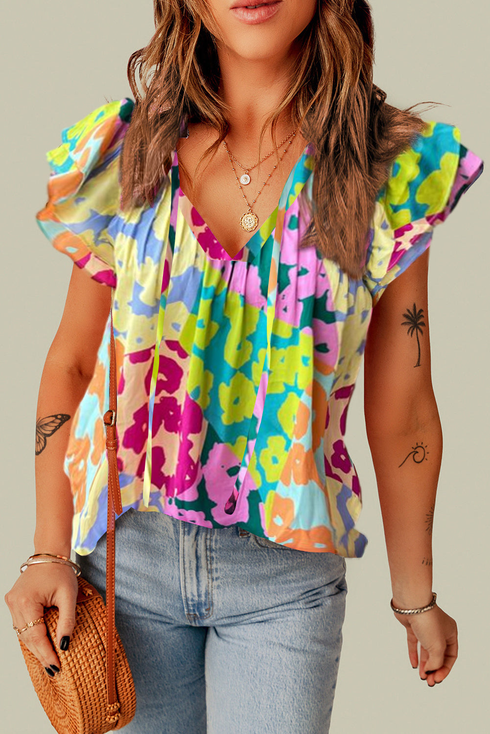 Multicolour Leopard Flutter Sleeve V Neck Crinkled BlouseMaterial:100%Polyester

• Stand out in style with this blouse, perfect for adding a touch of wild elegance to your wardrobe.
• The vibrant multicolored leopard pri