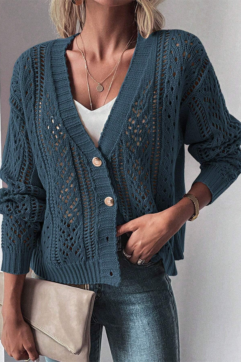 Real Teal Hollow Knit Drop Shoulder CardiganMaterial:60%Cotton+40%Acrylic

• Elevate your casual wardrobe with the cardigan, crafted for comfort and style, ideal for layering during transitional seasons.
• T