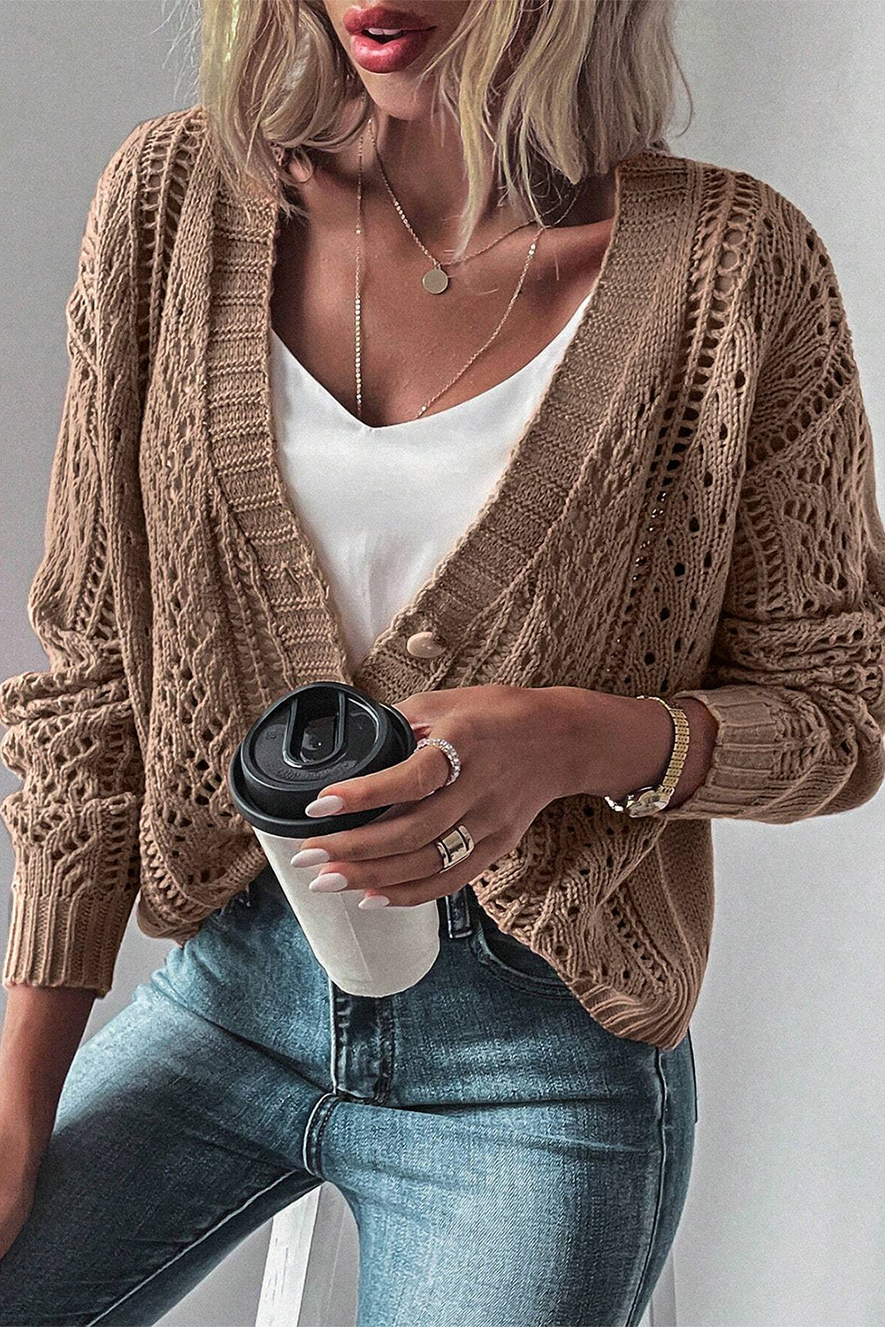 Real Teal Hollow Knit Drop Shoulder CardiganMaterial:60%Cotton+40%Acrylic

• Elevate your casual wardrobe with the cardigan, crafted for comfort and style, ideal for layering during transitional seasons.
• T