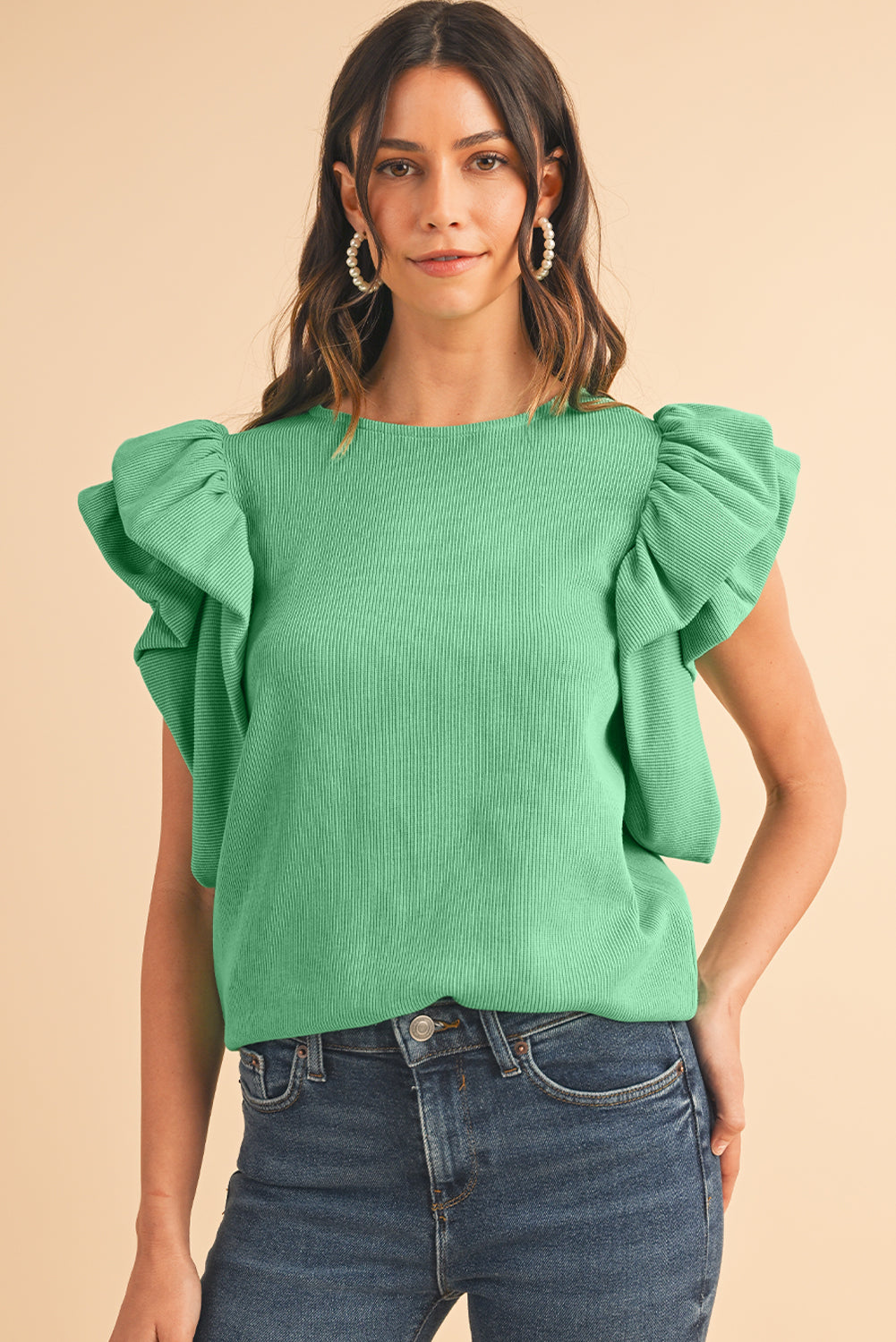 Green Solid Color Ruffle Sleeve Ribbed BlouseMaterial:65%cotton+33%polyester+2%Elastane



		The blouse features ruffle sleeves, which add a playful and romantic touch to the overall design. 
	
	
		The sol