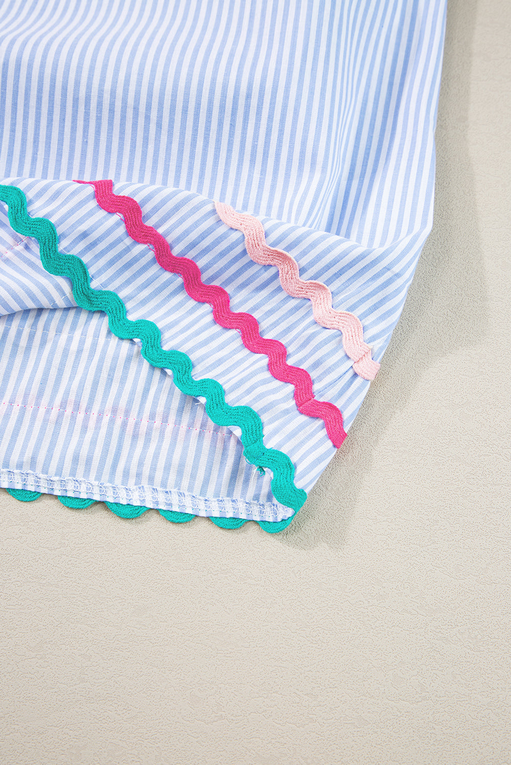 Sky Blue Striped Ricrac Splicing Frill V-Neck BlouseMaterial:100%Cotton



		Playful stripes: This blouse features a fun striped pattern with flirty frill details and a flattering V-neck.
	
	
		Chic and charming: