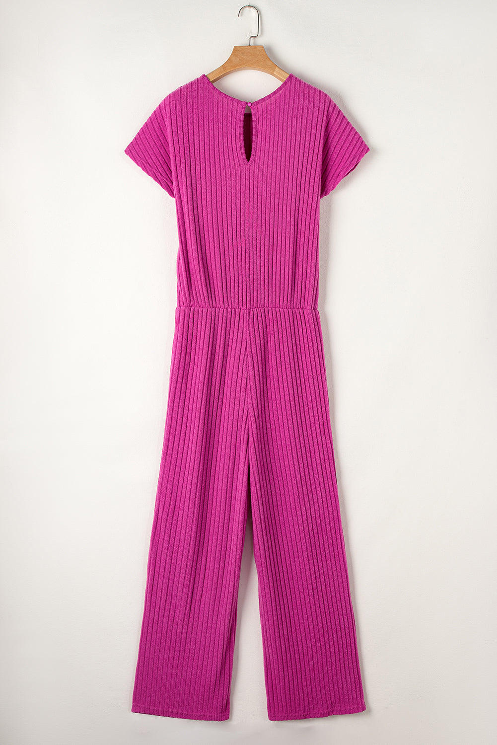 Grass Green Solid Color Ribbed Short Sleeve Wide Leg JumpsuitMaterial:85%Polyester+10%Viscose+5%Elastane



		The jumpsuit is a versatile and trendy one-piece outfit, featuring a solid color design that offers a sleek and mi