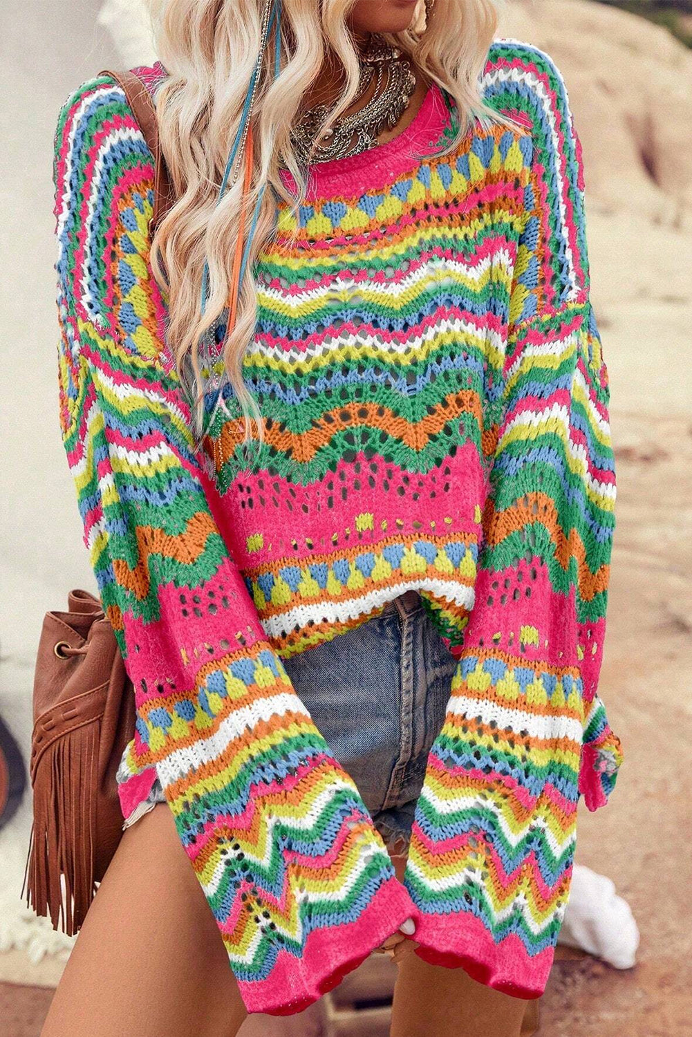 Rose Red Colorblock Striped Hollowed Knit Loose SweaterMaterial:55%Acrylic+45%Cotton

• Stay cozy and stylish in this sweater featuring a unique hollowed knit design for a trendy boho look.
• The loose fit of this swea