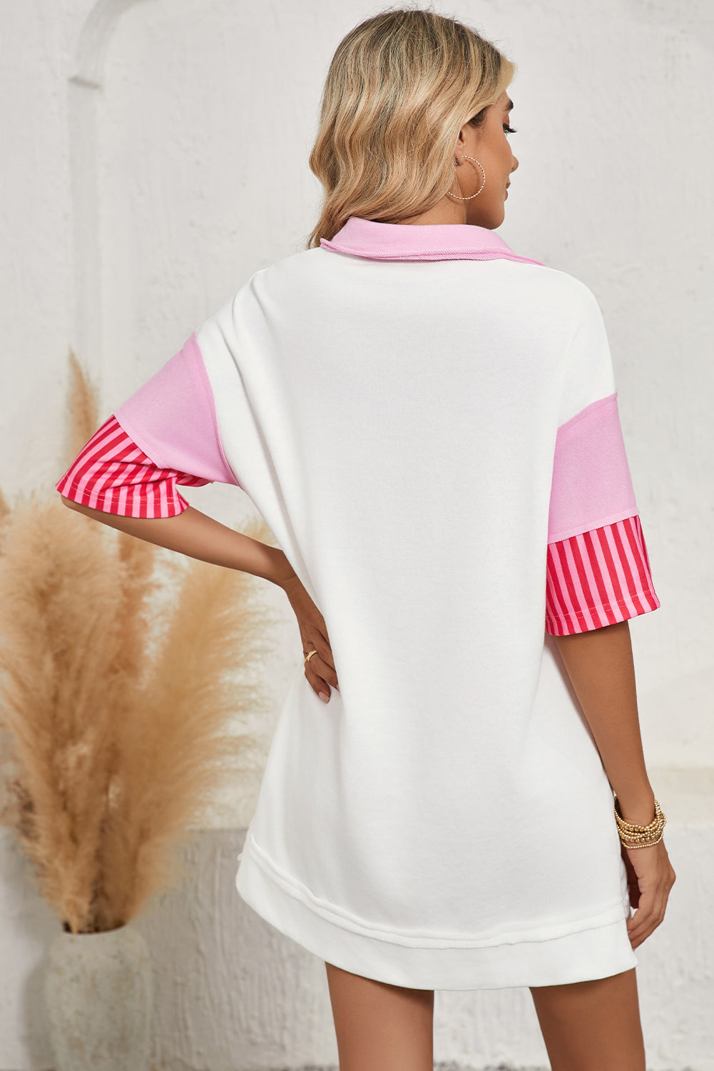 Pink Stripe Colorblock Sleeve Collared Mini DressMaterial:65%Polyester+35%Cotton

• The combination of pink and stripes adds a fun and trendy touch to your outfit.
• Embrace the relaxed vibes with the drop sleeve