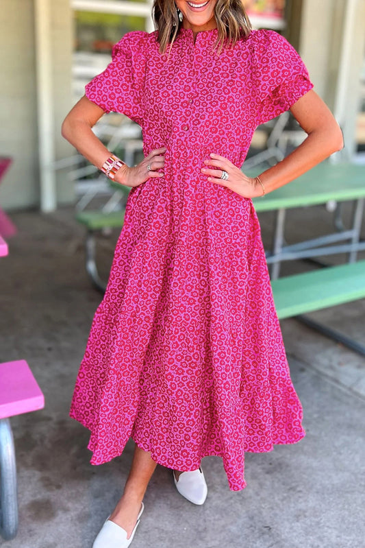 Rose Red Mock Neck Puff Sleeve Floral Tiered Maxi DressMaterial:100%Cotton

• Embrace romantic vibes with the maxi dress, featuring intricate flower prints that exude elegance and charm.
• Stand out with the unique puf