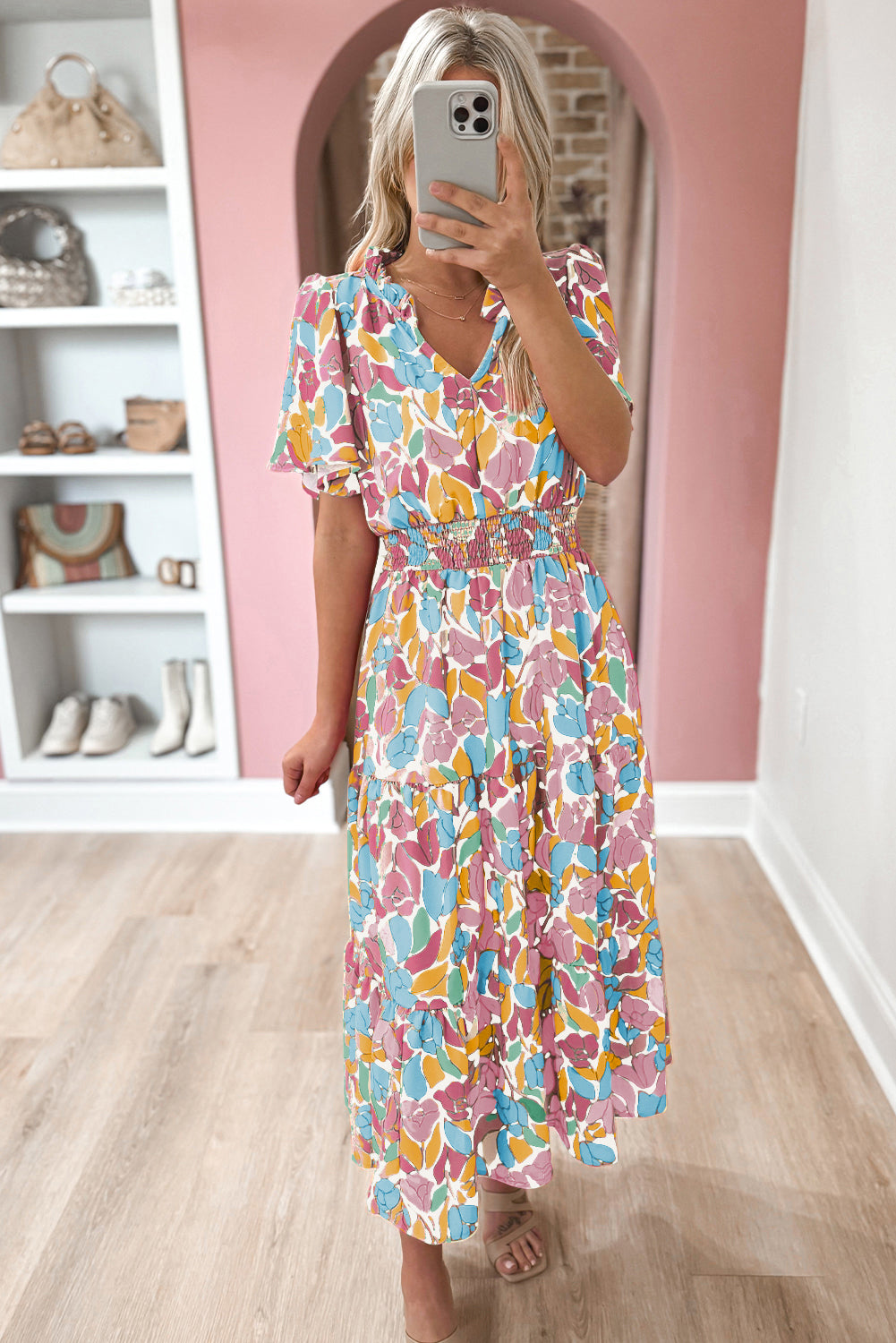 Rose Floral Flounce Sleeve Smocked Waist Tiered Maxi DressMaterial:100%Polyester

• Exude bohemian elegance in this maxi dress, featuring a smocked waist for a flattering silhouette.
• The tiered design adds a whimsical t