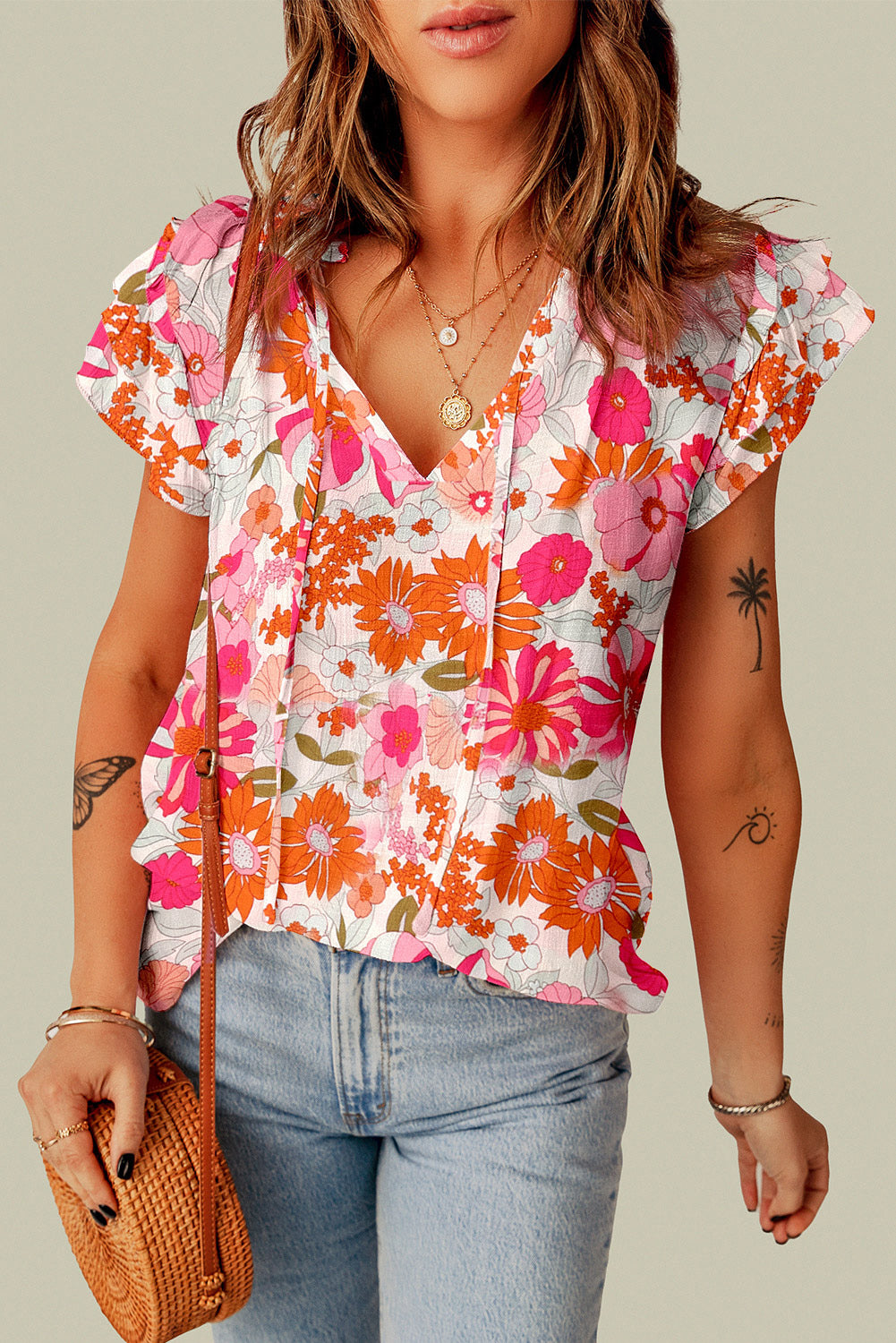 Multicolor Floral Print Ruffled Sleeve Split V Neck Peasant TopMaterial:100%Viscose



		•Perfect for boutiques and retailers.
	
	
		•Easy to wear and comfortable.
	
	
		•Features a trendy and stylish design.
	
	
		•I