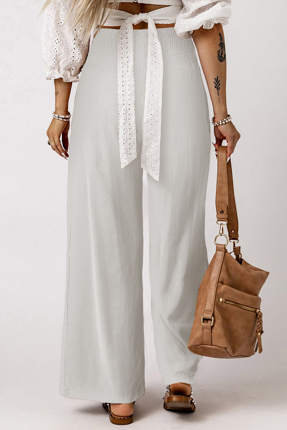 Black Smocked Wide Waistband High Waist Wide Leg PantsMaterial:65%COTTON+35%POLYESTER



		Flattering smocked waistband cinches at the
waist for a lovely silhouette
	
	
		High waist design elongates legs for a
st