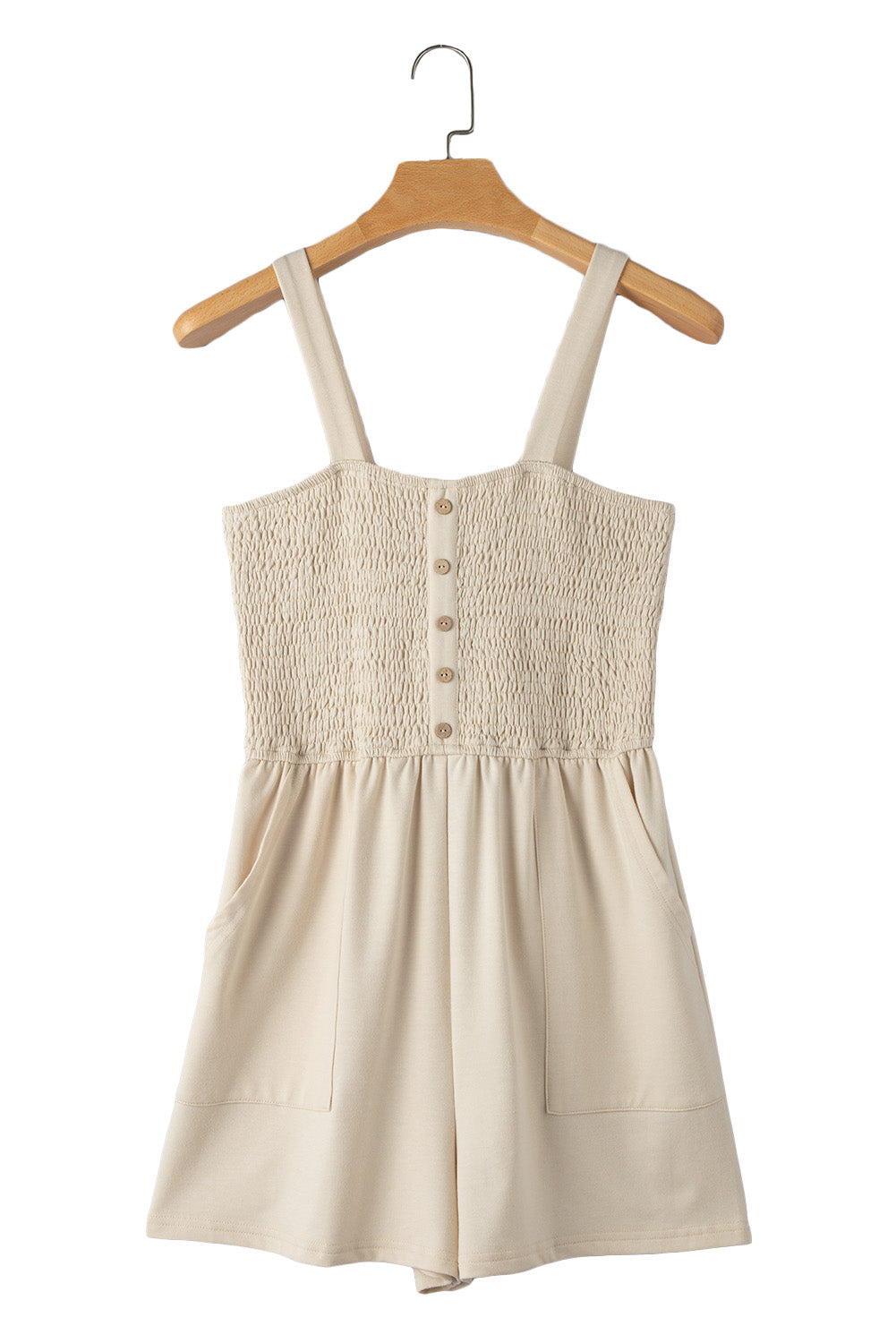 Beige Solid Color Buttons Smocked Sleeveless RomperMaterial:85%Polyester+10%Cotton+5%Elastane

• Its high waist design adds a flattering touch to any silhouette.
• Embrace the versatility of this romper with its sl