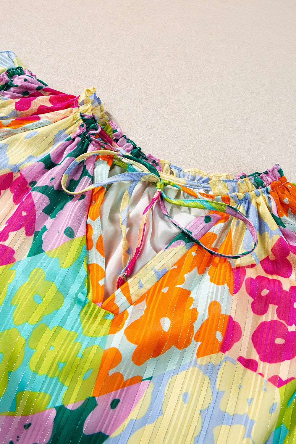Multicolour Leopard Flutter Sleeve V Neck Crinkled BlouseMaterial:100%Polyester

• Stand out in style with this blouse, perfect for adding a touch of wild elegance to your wardrobe.
• The vibrant multicolored leopard pri