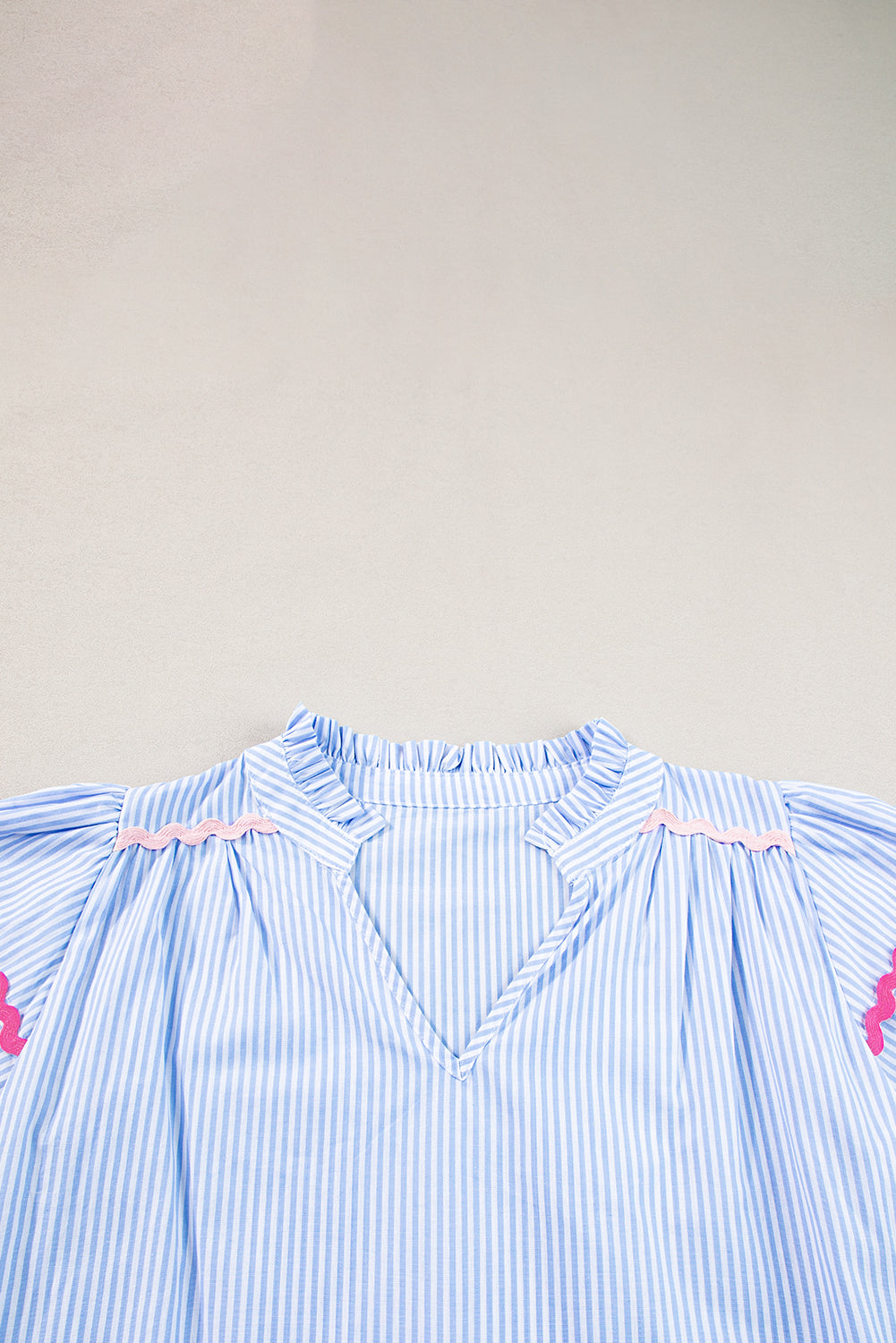 Sky Blue Striped Ricrac Splicing Frill V-Neck BlouseMaterial:100%Cotton



		Playful stripes: This blouse features a fun striped pattern with flirty frill details and a flattering V-neck.
	
	
		Chic and charming: