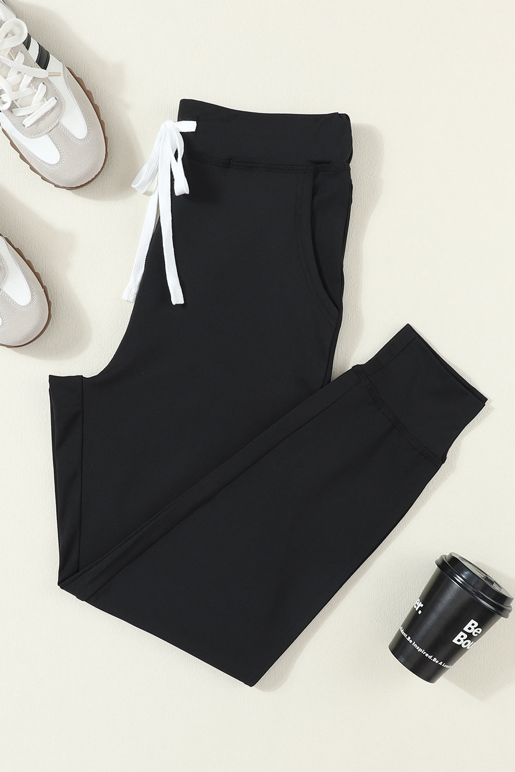 Black Casual Drawstring Drop Waist Pocketed JoggersMaterial:90%Polyester+10%Elastane



		Black can easily be paired with different tops and shoes, making it a go-to option for various outfits.
	
	
		The drawstr