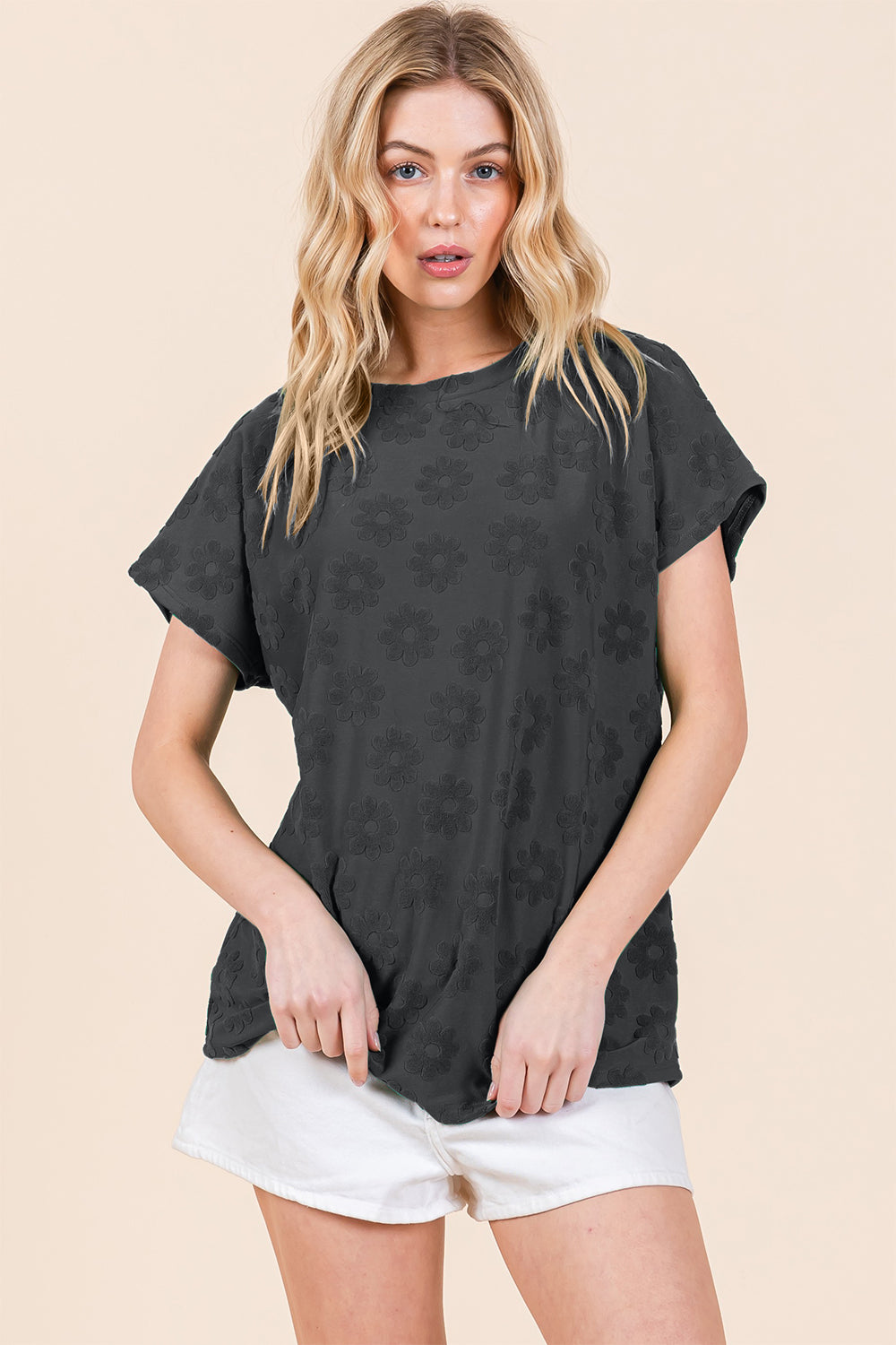 BOMBOM Textured Floral Pattern Short Sleeve T-ShirtThe Textured Floral Pattern Short Sleeve T-Shirt is a lovely and versatile addition to your casual wardrobe. The delicate floral pattern adds a touch of femininity t