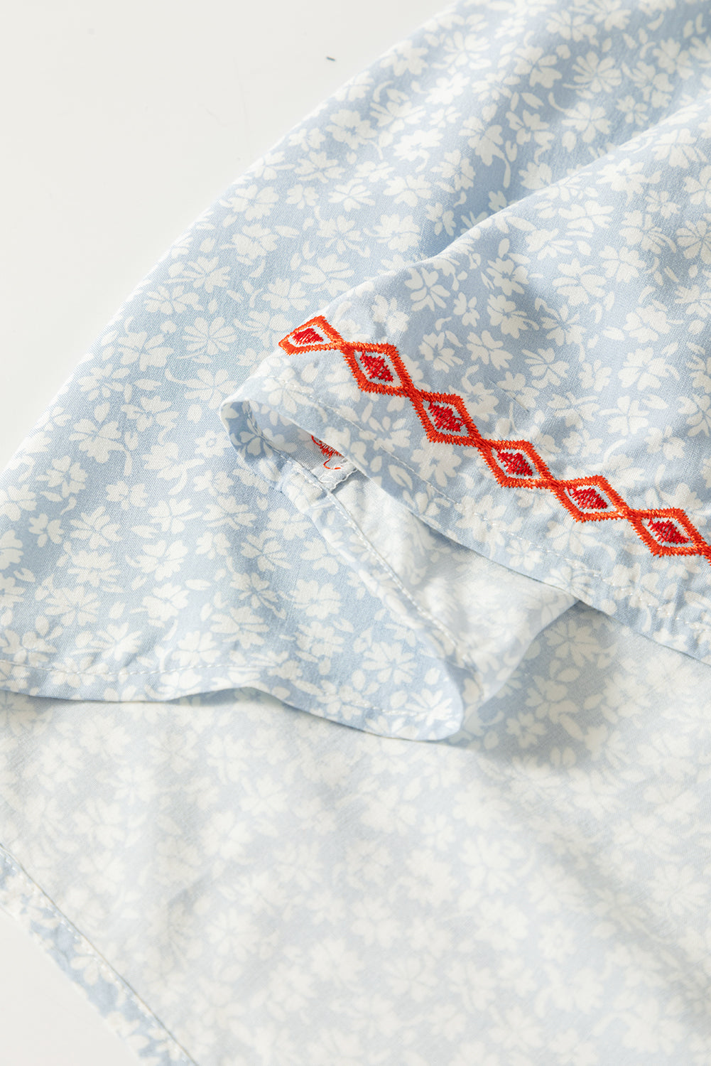 Sky Blue Boho Embroidered Floral Print Flutter Sleeve BlouseMaterial:100%Viscose



		The hobo embroidered detailing showcases skilled craftsmanship and adds a bohemian flair
	
	
		The floral pattern brings a touch of fe