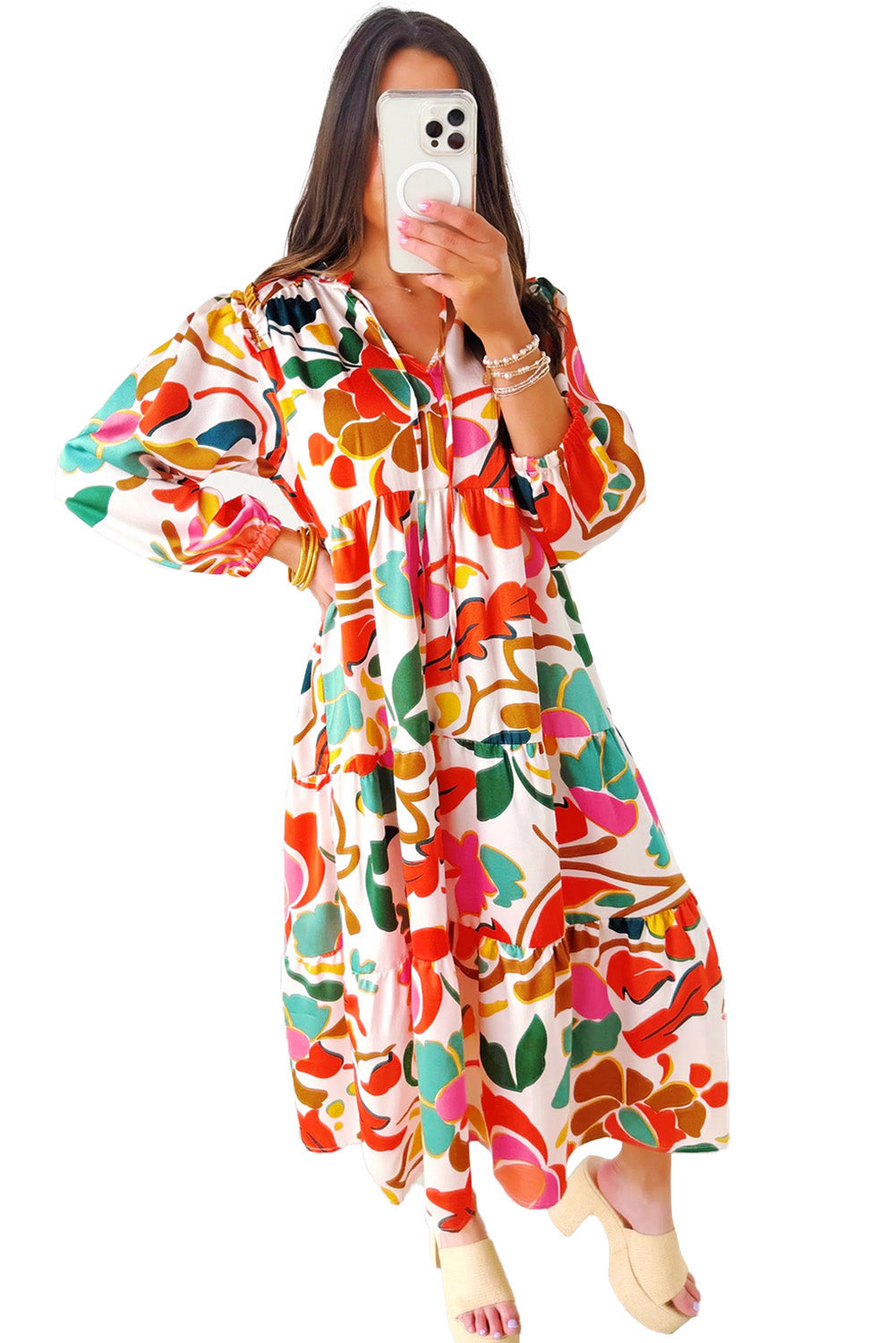 Orange Abstract Tie V Neck Tiered Maxi DressMaterial:100%Polyester

• Stand out in this maxi dress, perfect for boho-chic lovers seeking a vibrant statement piece.
• The abstract print adds a touch of artist