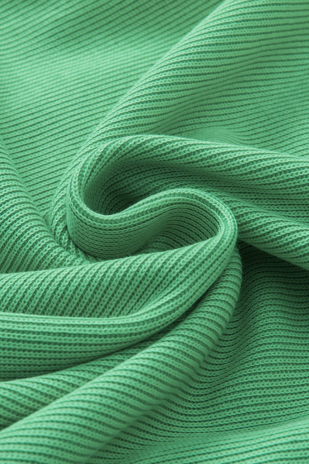 Green Solid Color Ruffle Sleeve Ribbed BlouseMaterial:65%cotton+33%polyester+2%Elastane



		The blouse features ruffle sleeves, which add a playful and romantic touch to the overall design. 
	
	
		The sol