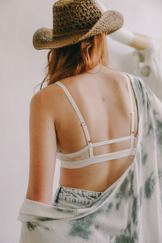 Center Cross Strap Lace BraletteCenter Cross Strap Lace BraletteSheer mesh liningCare Label Tag Stitched on Inner SeamImmediate ShippingCup FitS: 32B 32C 34A 34BM: 32D 34C 36A 36BL: 32DD 34D 36C 38