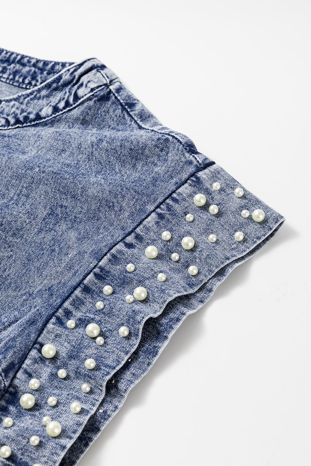 Dusk Blue Acid Wash Pearl Embellishment O Neck Denim TopMaterial:100%Cotton



		The top features a trendy acid wash design with pearl embellishments, adding a touch of sophistication to your outfit.
	
	
		This denim