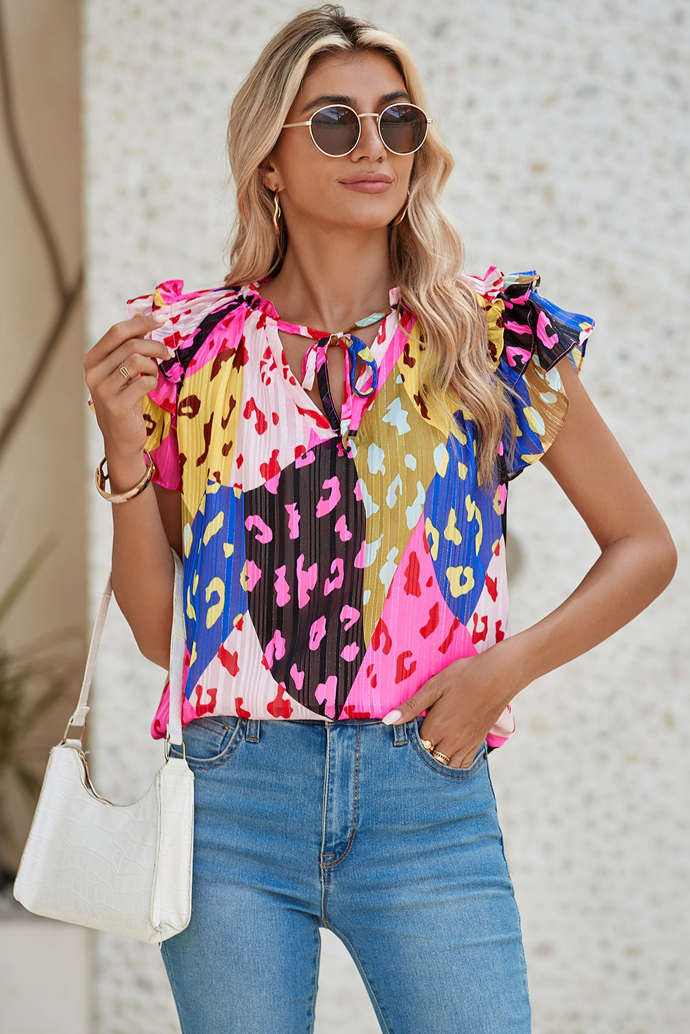 Multicolour Leopard Flutter Sleeve V Neck Crinkled BlouseMaterial:100%Polyester

• Stand out in style with this blouse, perfect for adding a touch of wild elegance to your wardrobe.
• The vibrant multicolored leopard pri
