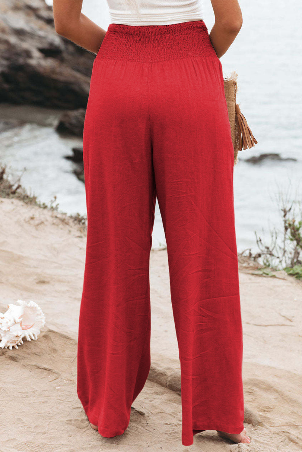 Black Smocked Wide Waistband High Waist Wide Leg PantsMaterial:65%COTTON+35%POLYESTER



		Flattering smocked waistband cinches at the
waist for a lovely silhouette
	
	
		High waist design elongates legs for a
st