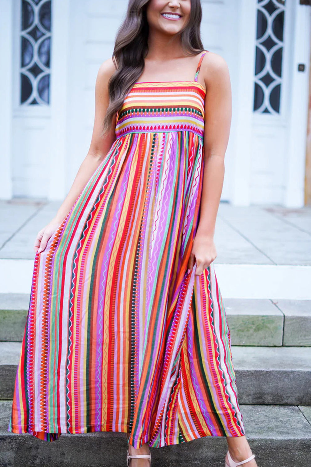 Multicolour Boho Striped Spaghetti Strap Smocked Back Maxi DressMaterial:100%Polyester

• Embrace a vibrant blend of colors in this maxi dress, perfect for daily wear with its relaxed, sleeveless design.
• The shirred back ensu