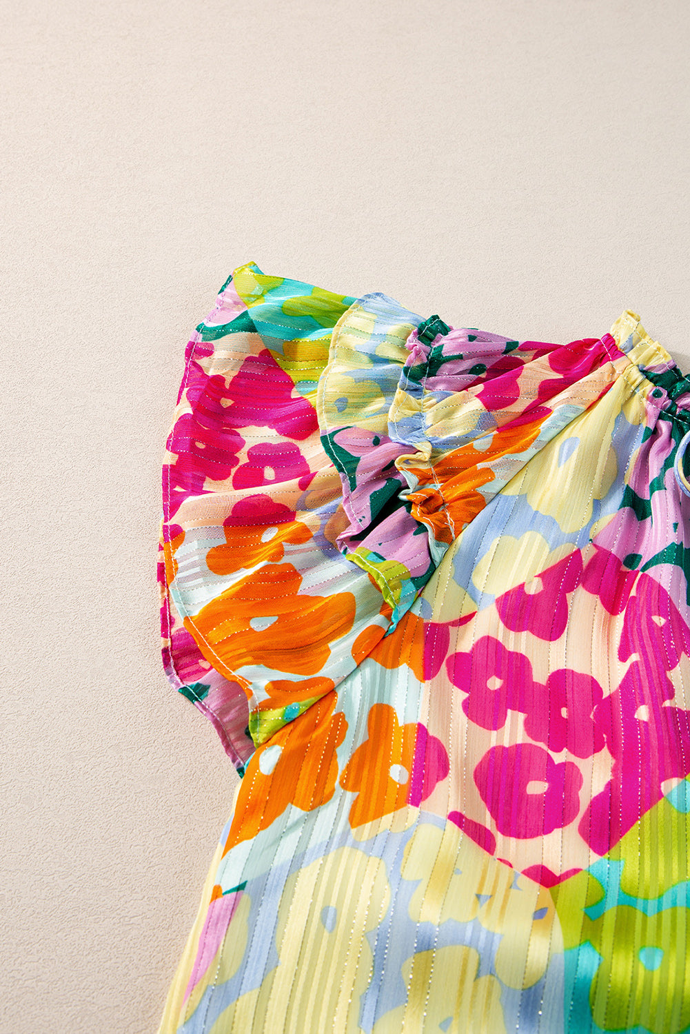 Multicolour Leopard Flutter Sleeve V Neck Crinkled BlouseMaterial:100%Polyester

• Stand out in style with this blouse, perfect for adding a touch of wild elegance to your wardrobe.
• The vibrant multicolored leopard pri