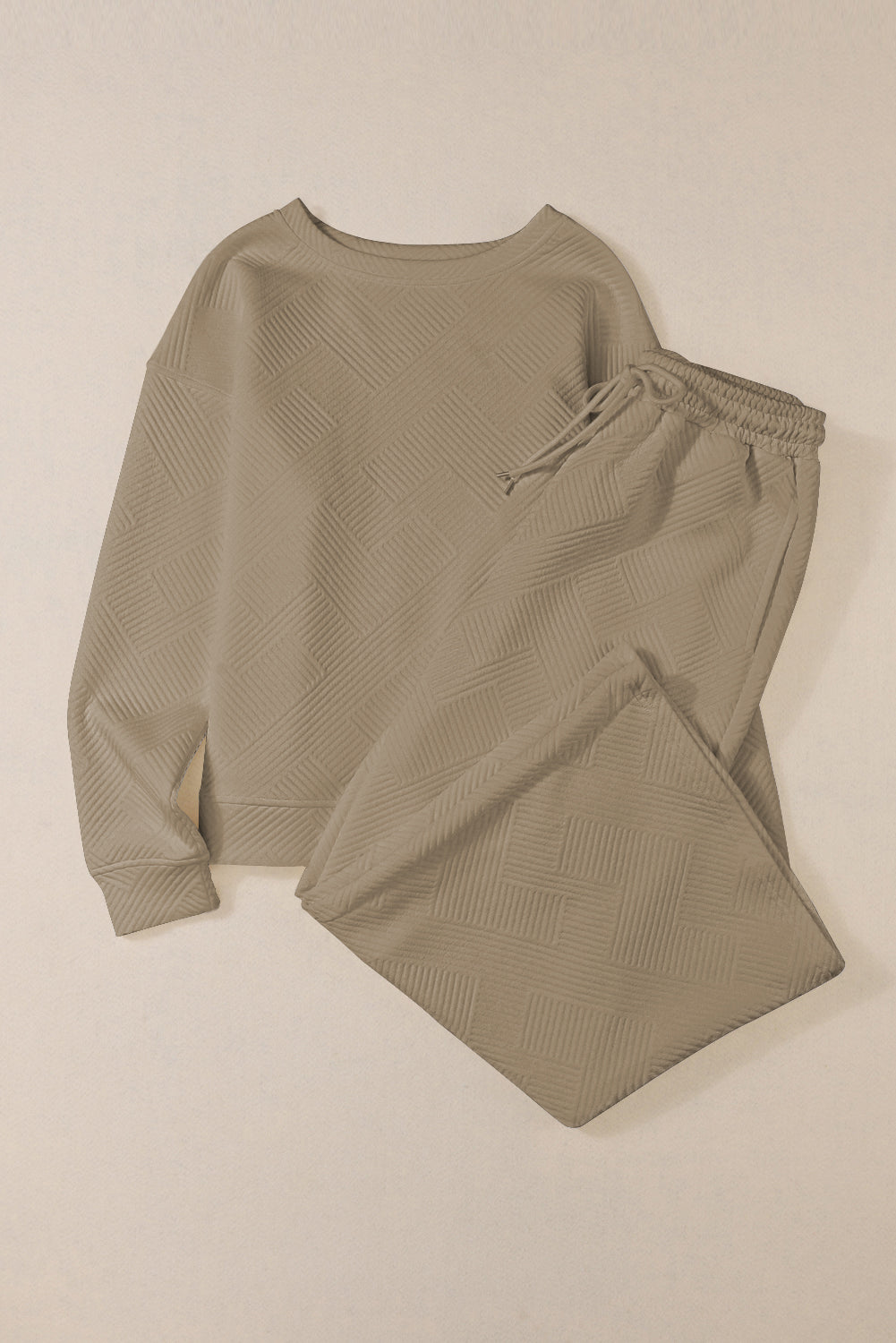 Red Dahlia Textured Loose Slouchy Long Sleeve Top and Pants SetMaterial:95%POLYESTER+5%ELASTANE



		Our Gray Textured Loose Slouchy Long Sleeve Top and Pants Set, a comfortable and stylish ensemble that is perfect for loungin