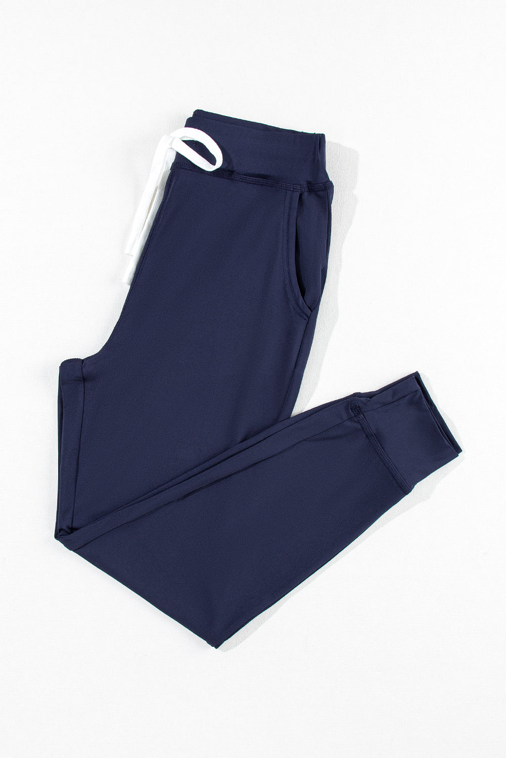 Black Casual Drawstring Drop Waist Pocketed JoggersMaterial:90%Polyester+10%Elastane



		Black can easily be paired with different tops and shoes, making it a go-to option for various outfits.
	
	
		The drawstr