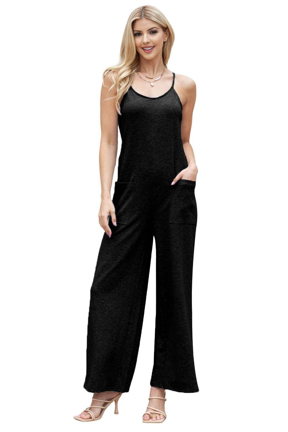 Gray Loose Fit Side Pockets Spaghetti Strap Wide Leg JumpsuitMaterial:65%Polyester+30%Cotton+5%Elastane



		Featuring a loose fit, the wide leg
jumpsuit provides freedom of movement
	
	
		Spaghetti straps highlight wome