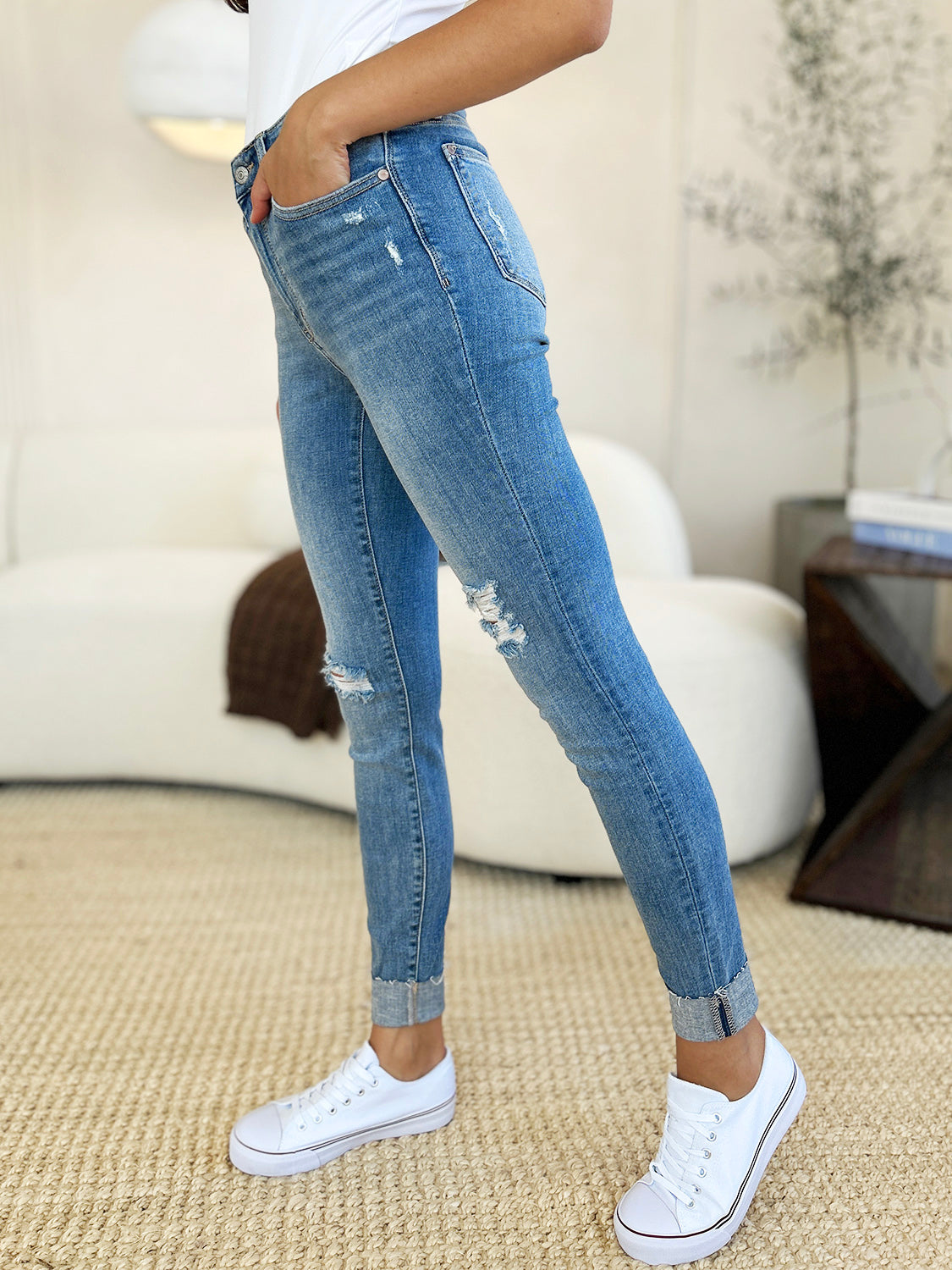 Judy Blue Full Size Mid Rise Destroy & Cuff Skinny JeansThese Mid Rise Destroy &amp; Cuff Skinny Jeans are the perfect blend of edgy and chic, offering a versatile style that can be dressed up or down. The mid rise waist 