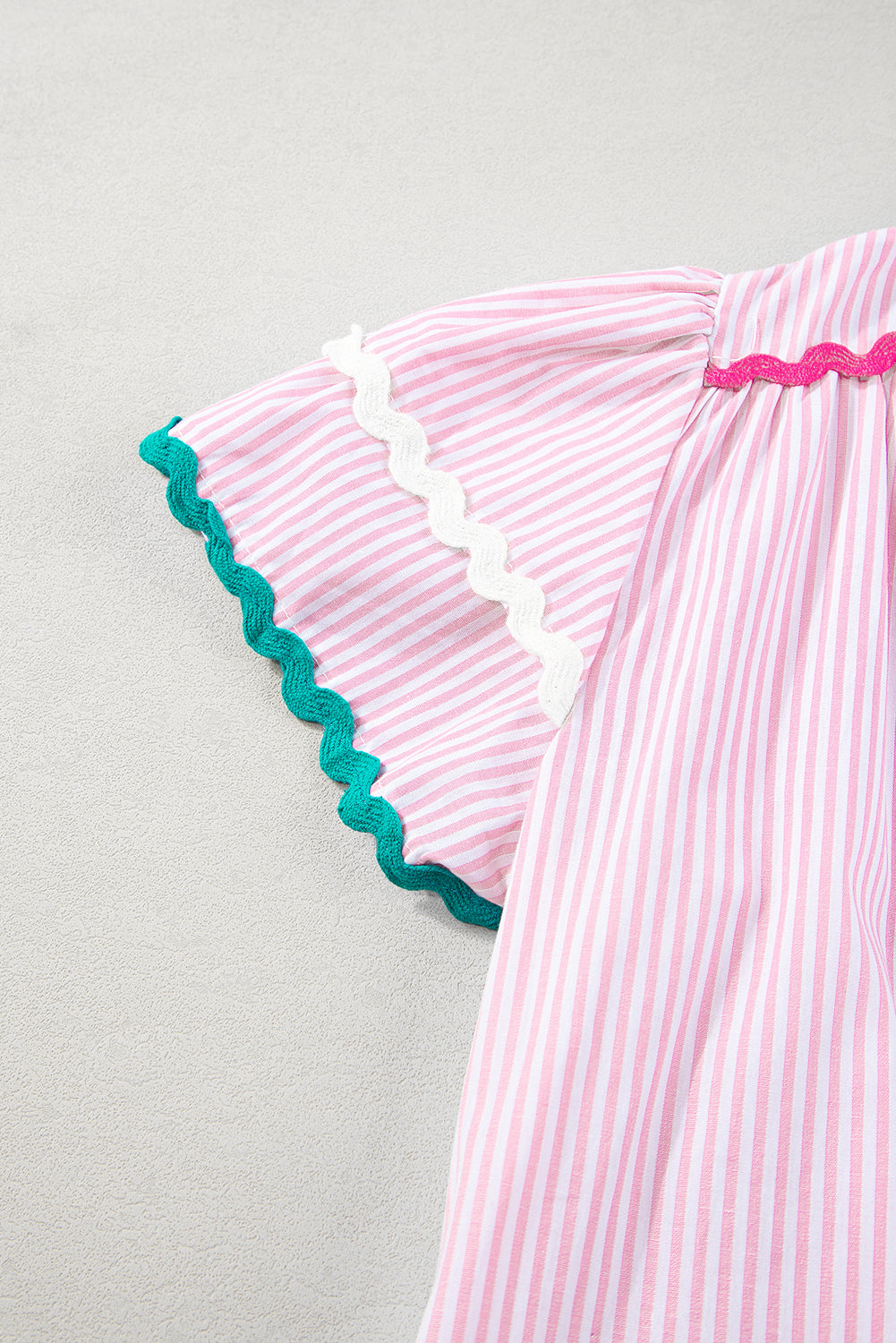 Sky Blue Striped Ricrac Splicing Frill V-Neck BlouseMaterial:100%Cotton



		Playful stripes: This blouse features a fun striped pattern with flirty frill details and a flattering V-neck.
	
	
		Chic and charming: