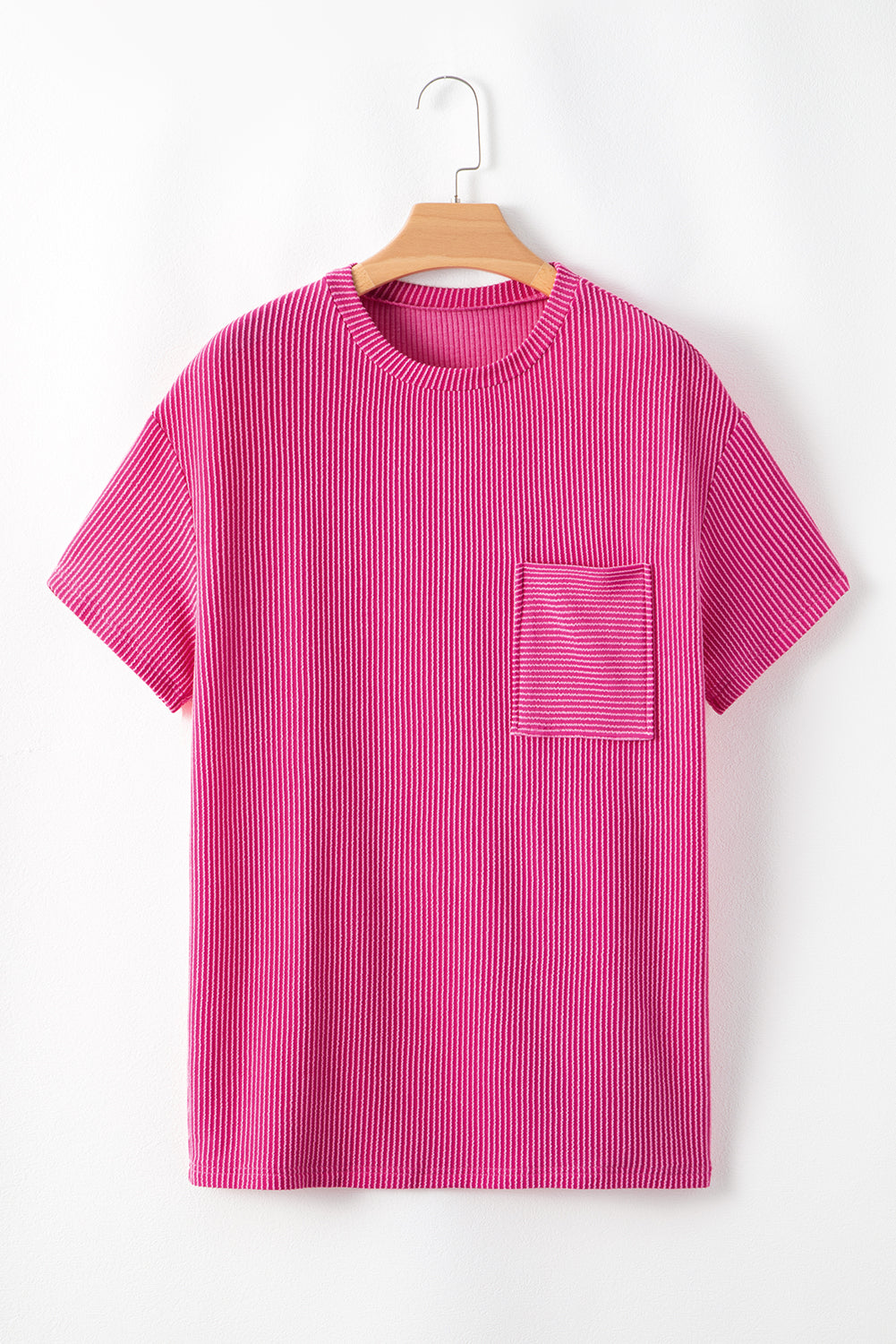 Pink Crinkle Rib Knit Pocketed Loose Fit Crew Neck T ShirtMaterial:75%Polyester+20%Viscose+5%Elastane

• Pink T Shirt offers a charming, feminine touch with its soft pink color and crinkle rib texture, perfect for a casual