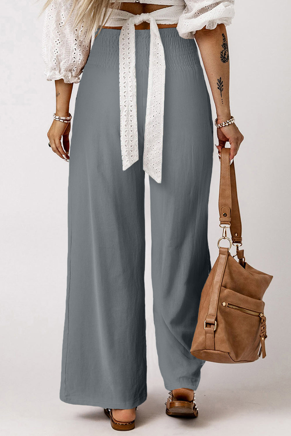 Black Smocked Wide Waistband High Waist Wide Leg PantsMaterial:65%COTTON+35%POLYESTER



		Flattering smocked waistband cinches at the
waist for a lovely silhouette
	
	
		High waist design elongates legs for a
st