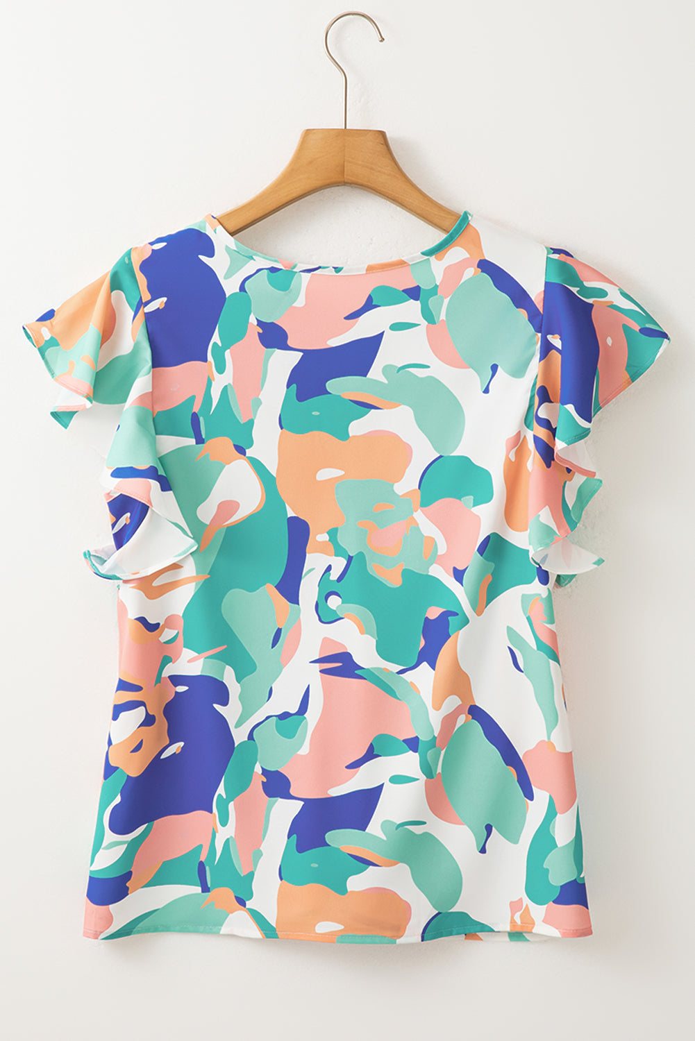 Green Abstract Print Smocked Notched Neck Ruffle Sleeve BlouseMaterial:100%Polyester

• Embrace a bohemian spirit with the blouse, featuring a vibrant green hue that adds a pop of color to any outfit.
• The abstract print des