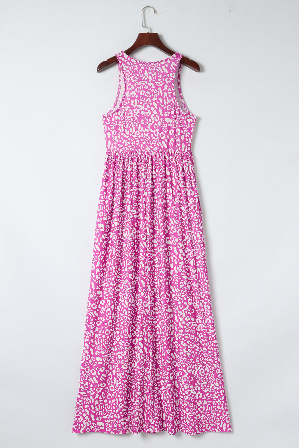 Pink Sleeveless Floor Length Leopard Print Dress with PocketsMaterial:95%POLYESTER+5%ELASTANE



		•The dress features a bold and eye-catching leopard print design.
	
	
		•The floor length and sleeveless design make it pe