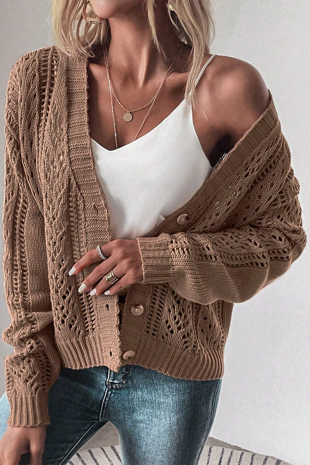 Real Teal Hollow Knit Drop Shoulder CardiganMaterial:60%Cotton+40%Acrylic

• Elevate your casual wardrobe with the cardigan, crafted for comfort and style, ideal for layering during transitional seasons.
• T