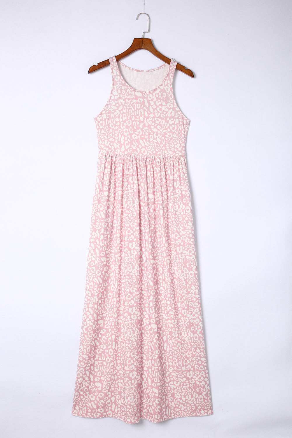 Pink Sleeveless Floor Length Leopard Print Dress with PocketsMaterial:95%POLYESTER+5%ELASTANE



		•The dress features a bold and eye-catching leopard print design.
	
	
		•The floor length and sleeveless design make it pe