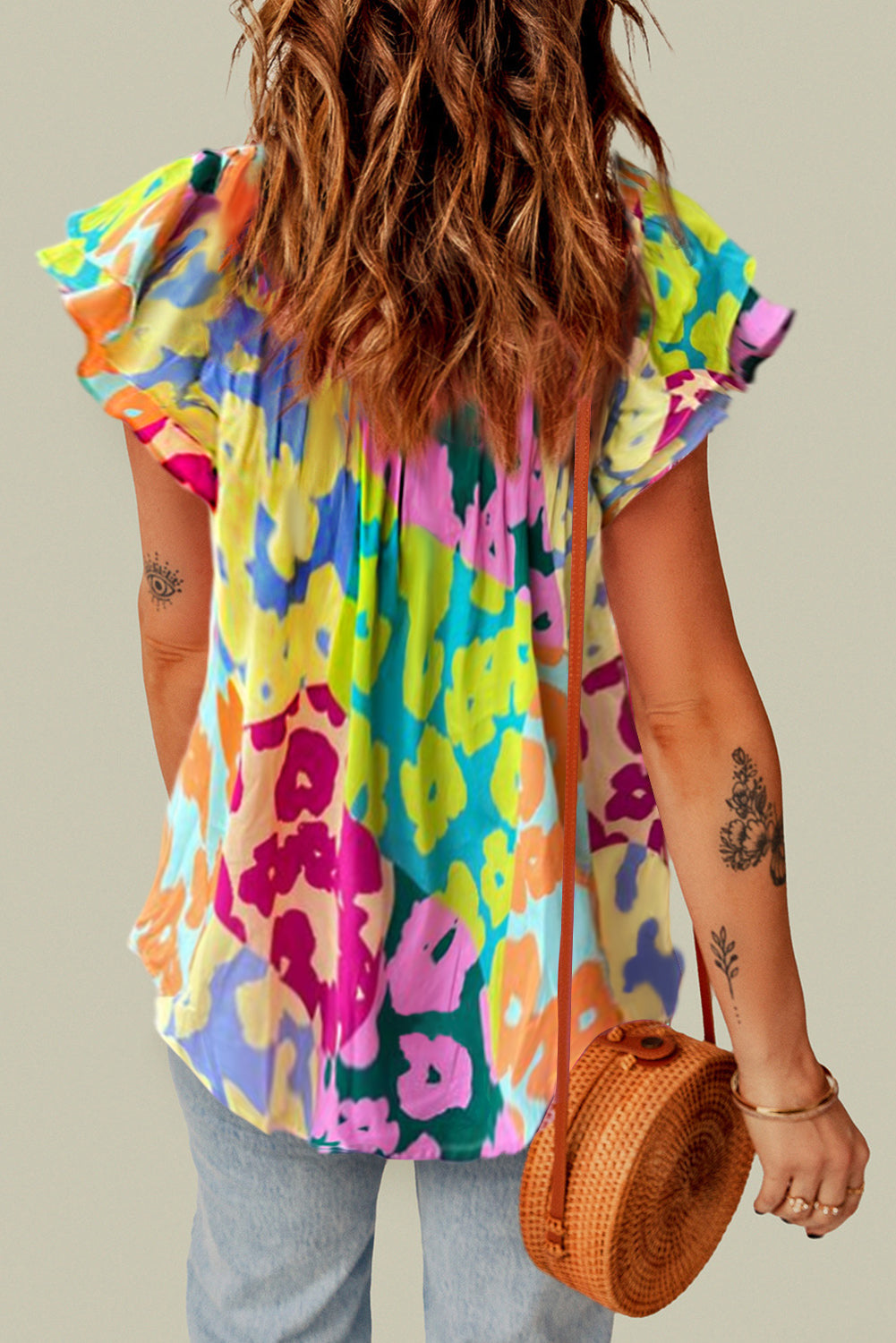 Multicolour Leopard Flutter Sleeve V Neck Crinkled BlouseMaterial:100%Polyester

• Stand out in style with this blouse, perfect for adding a touch of wild elegance to your wardrobe.
• The vibrant multicolored leopard pri