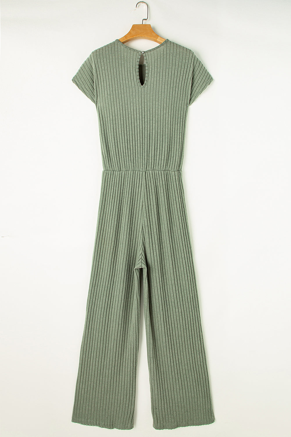 Grass Green Solid Color Ribbed Short Sleeve Wide Leg JumpsuitMaterial:85%Polyester+10%Viscose+5%Elastane



		The jumpsuit is a versatile and trendy one-piece outfit, featuring a solid color design that offers a sleek and mi