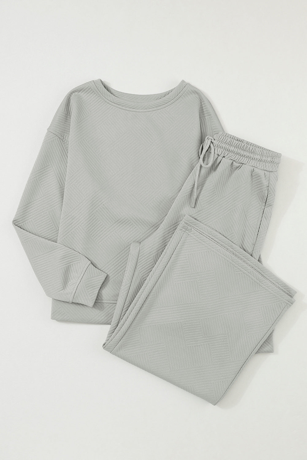 Red Dahlia Textured Loose Slouchy Long Sleeve Top and Pants SetMaterial:95%POLYESTER+5%ELASTANE



		Our Gray Textured Loose Slouchy Long Sleeve Top and Pants Set, a comfortable and stylish ensemble that is perfect for loungin