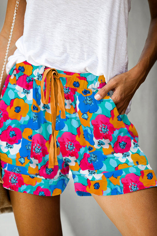 Multicolor Floral Print Drawstring Elastic Waist ShortsMaterial:100%Polyester



		The shorts are the perfect addition to any summer wardrobe, offering comfort and style in one chic package.
	
	
		With their vibrant