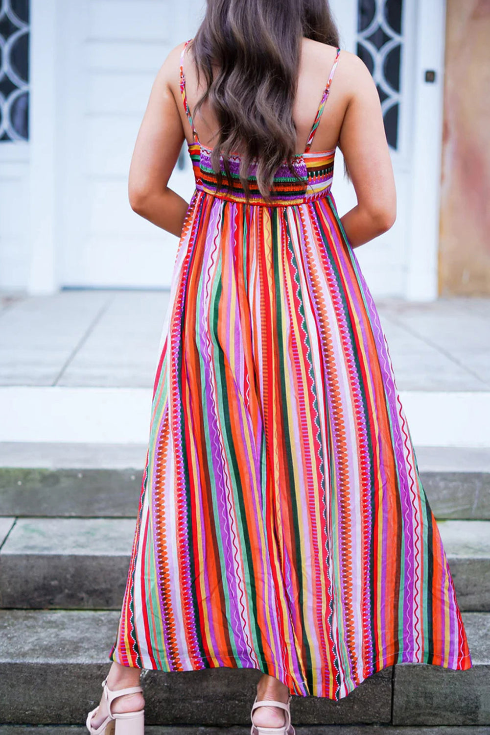 Multicolour Boho Striped Spaghetti Strap Smocked Back Maxi DressMaterial:100%Polyester

• Embrace a vibrant blend of colors in this maxi dress, perfect for daily wear with its relaxed, sleeveless design.
• The shirred back ensu