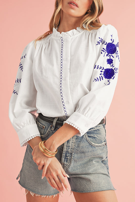 White Floral Embroidered Button Up Boho BlouseMaterial:100%Cotton

• Delicate boho blouse adorned with intricate floral embroidery, exuding a charming and feminine allure.
• Lightweight and breathable fabric m