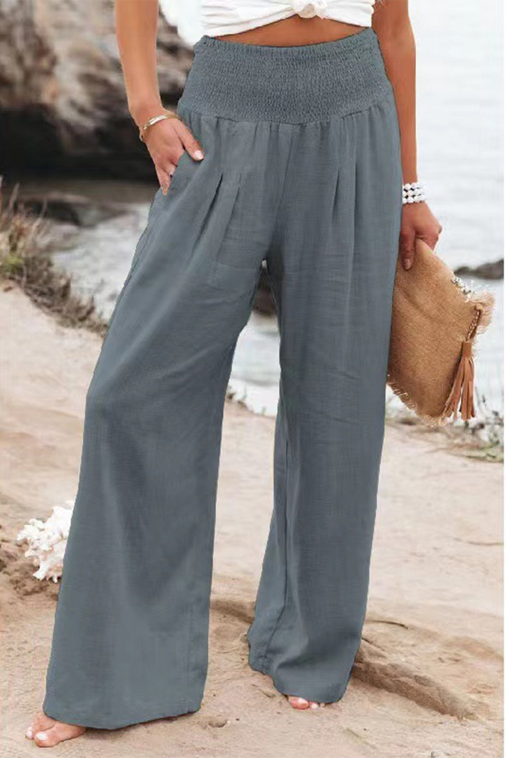 Black Smocked Wide Waistband High Waist Wide Leg PantsMaterial:65%COTTON+35%POLYESTER



		Flattering smocked waistband cinches at the
waist for a lovely silhouette
	
	
		High waist design elongates legs for a
st