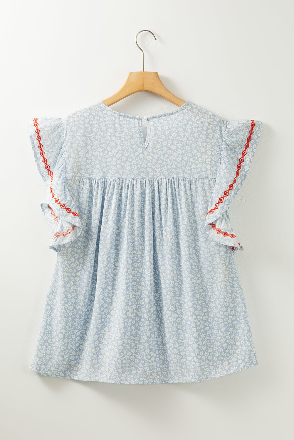 Sky Blue Boho Embroidered Floral Print Flutter Sleeve BlouseMaterial:100%Viscose



		The hobo embroidered detailing showcases skilled craftsmanship and adds a bohemian flair
	
	
		The floral pattern brings a touch of fe