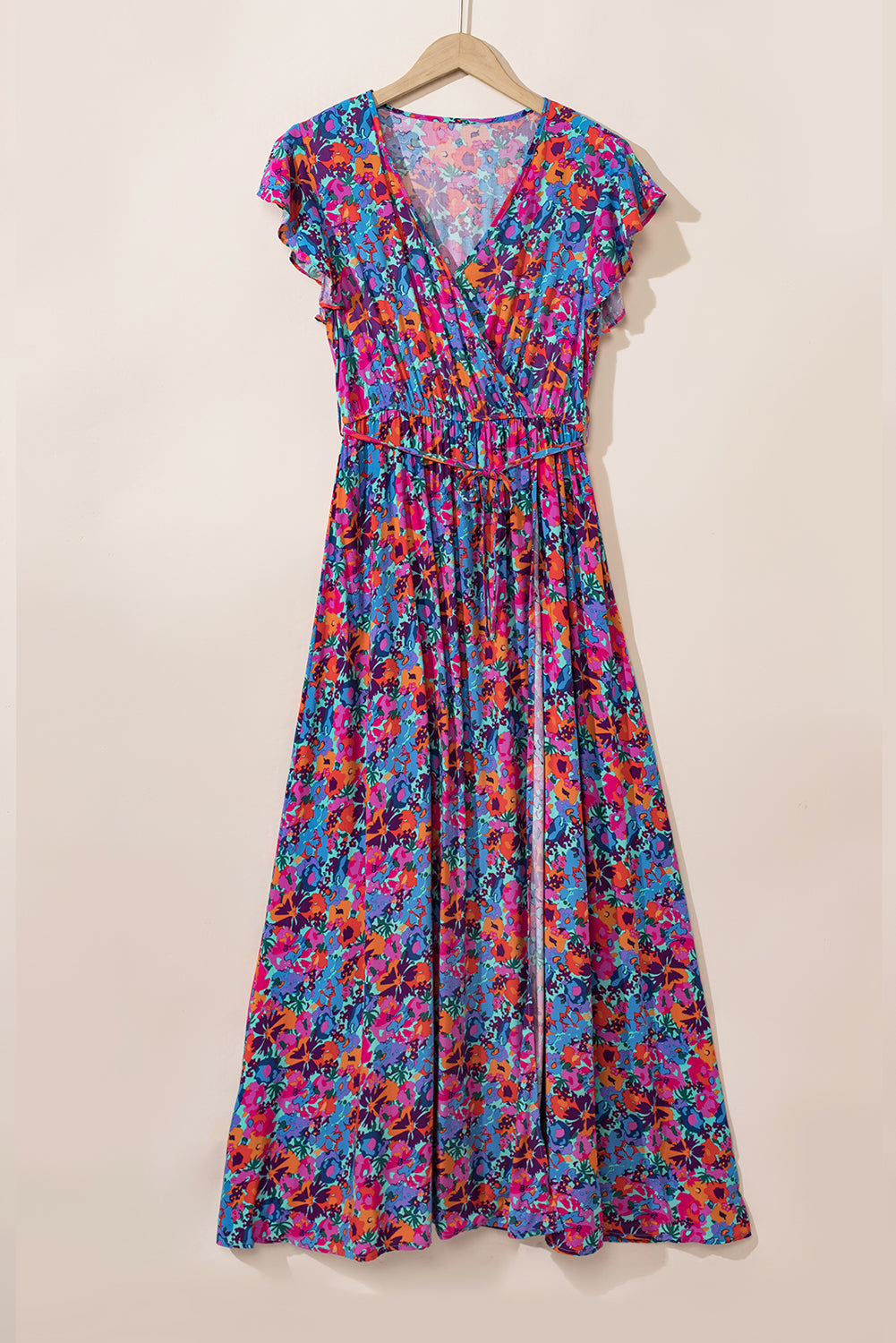Blue Boho Floral Print V Neck Wrap Split Maxi DressMaterial:100%Viscose



		This high waist dress elongates the silhouette and creates a flattering hourglass shape
	
	
		The side slit adds a touch of allure and