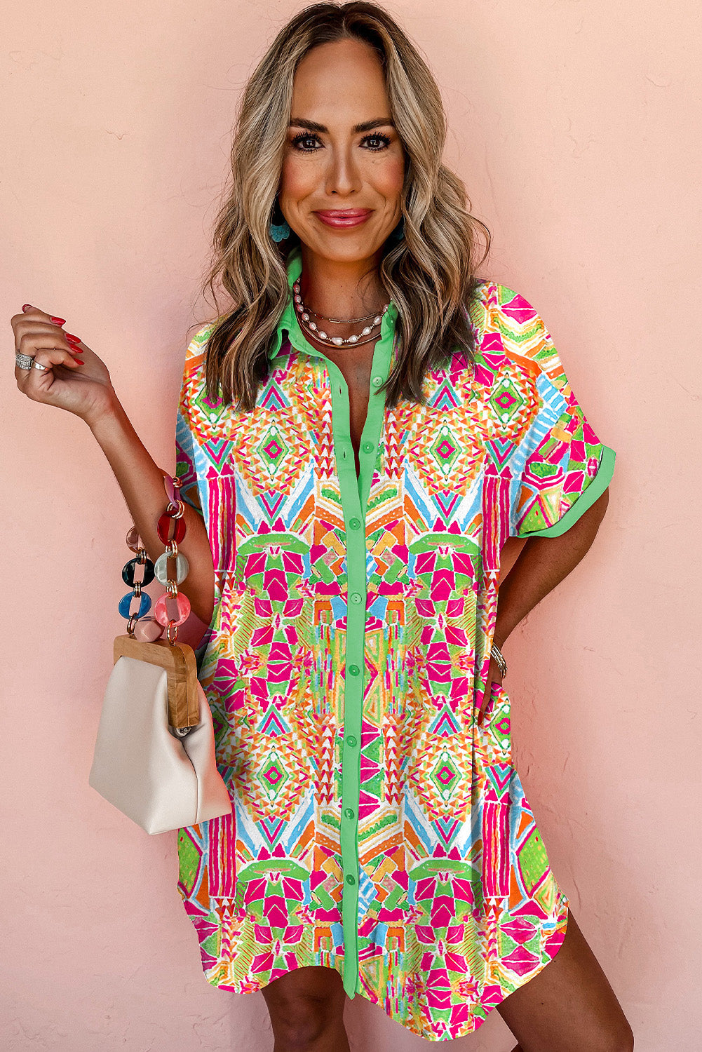 Orange Geometric Print Contrast Trim Short Sleeve Shirt DressMaterial:100%Polyester

• Stand out in vibrant orange hues with this dress featuring a geometric print that adds a trendy touch to your wardrobe. 
• The button-dow
