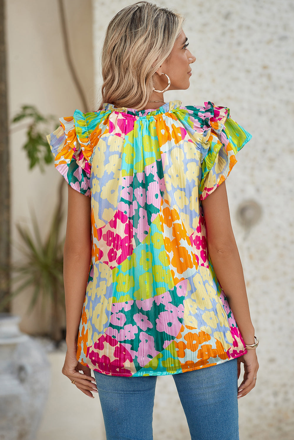 Multicolour Leopard Flutter Sleeve V Neck Crinkled BlouseMaterial:100%Polyester

• Stand out in style with this blouse, perfect for adding a touch of wild elegance to your wardrobe.
• The vibrant multicolored leopard pri