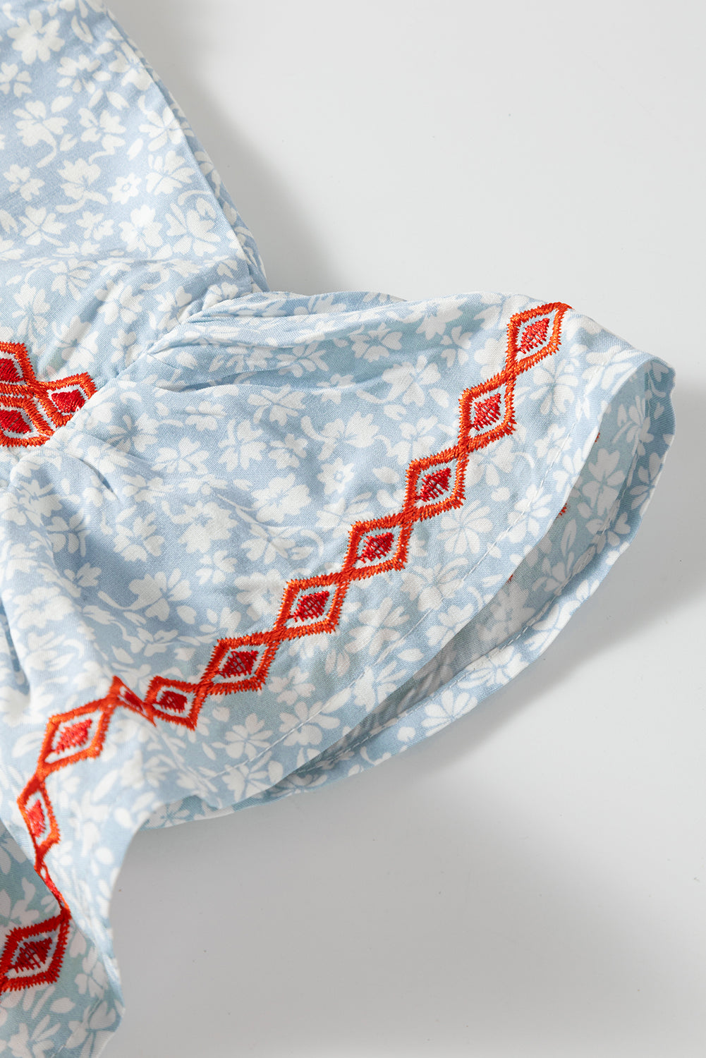 Sky Blue Boho Embroidered Floral Print Flutter Sleeve BlouseMaterial:100%Viscose



		The hobo embroidered detailing showcases skilled craftsmanship and adds a bohemian flair
	
	
		The floral pattern brings a touch of fe